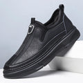 Men's black leather casual Oxford shoes with round toe and lace-up front on a white background.