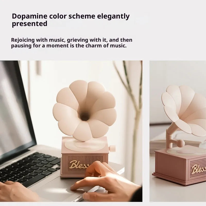 Retro white noise bluetooth speaker in black red, gray white, and lotus pink on a surface