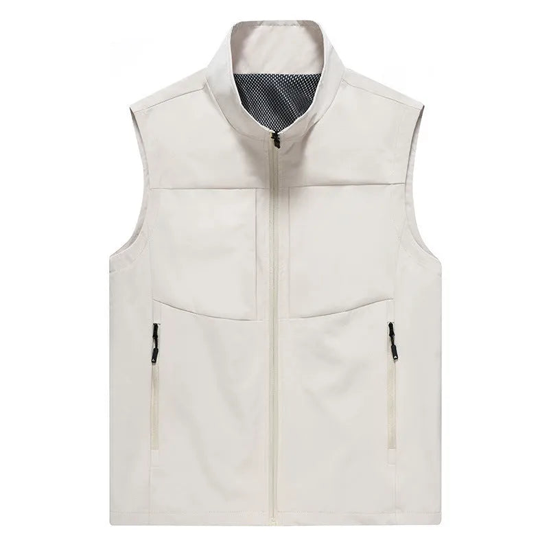 Man wearing a khaki stand collar cardigan vest with zipper pockets.
