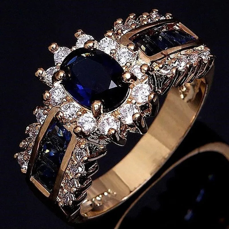Personalised sunflower blue diamond ring and square-cut zircon designs in zinc alloy for unisex wear.