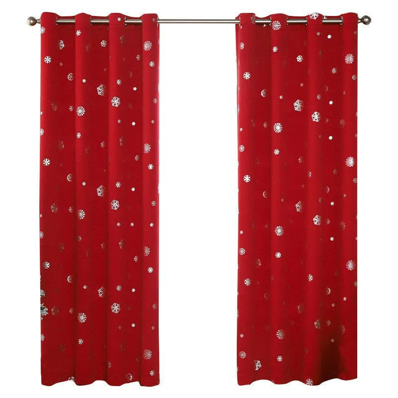 Red snowflake pattern shade cloth curtain with iron hoop hanging tabs.