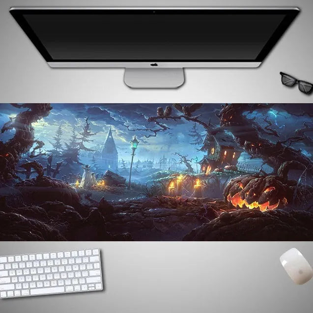 Oversized Halloween-themed gaming mouse pad with non-slip base on a desk.