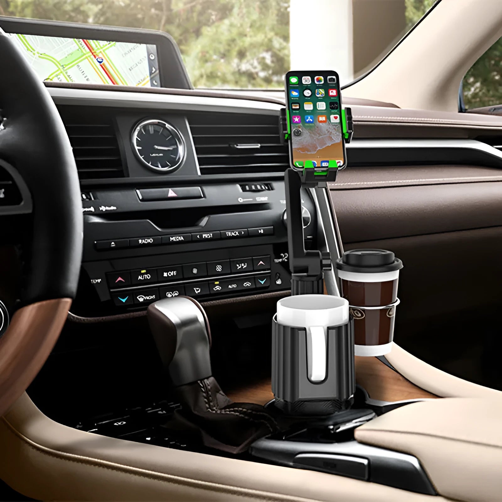 Green car drink and kettle holder with integrated mobile phone slot, showing compact plastic design.