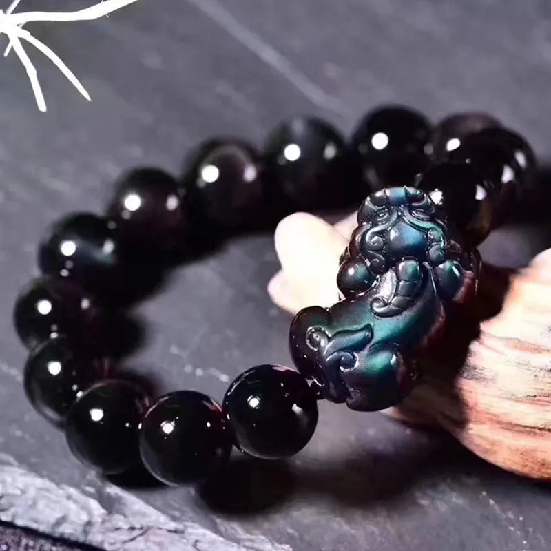 Natural ice colour eye obsidian crystal bracelet with banded patterns, shown in various bead sizes.