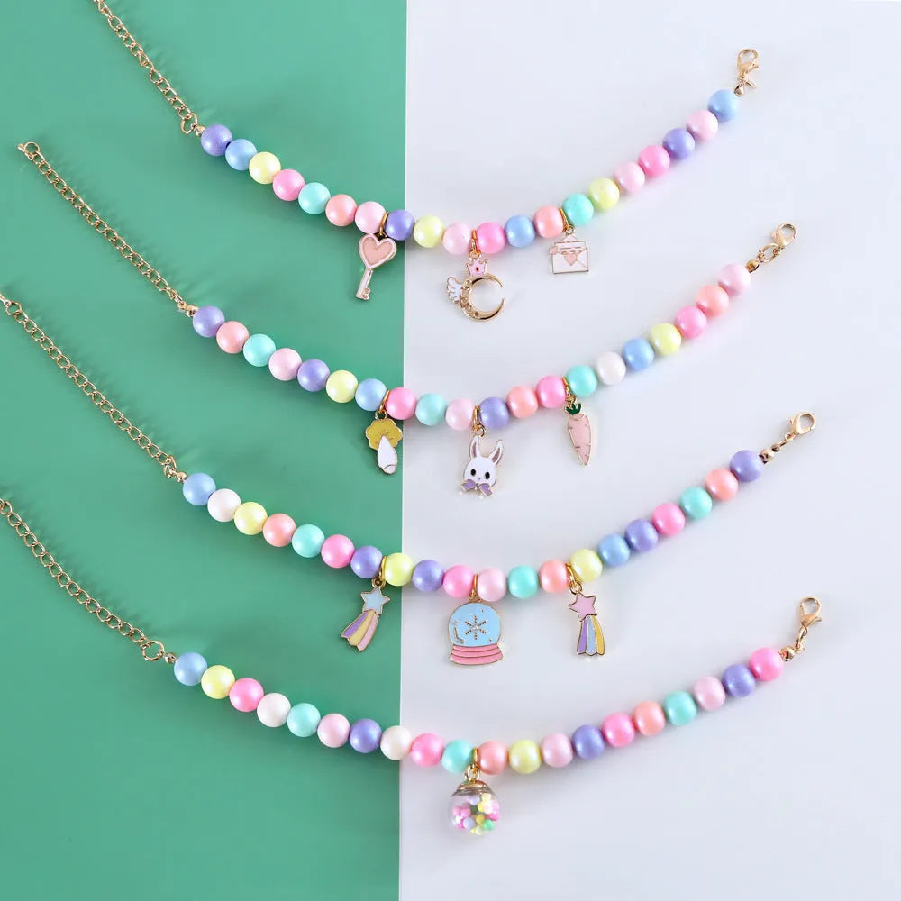 Macaron-themed pet collar accessories in resin with adjustable sizing options