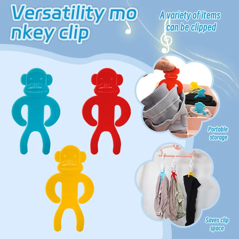 Plastic anti-winding socks clips in blue, yellow, and red colours for laundry organisation