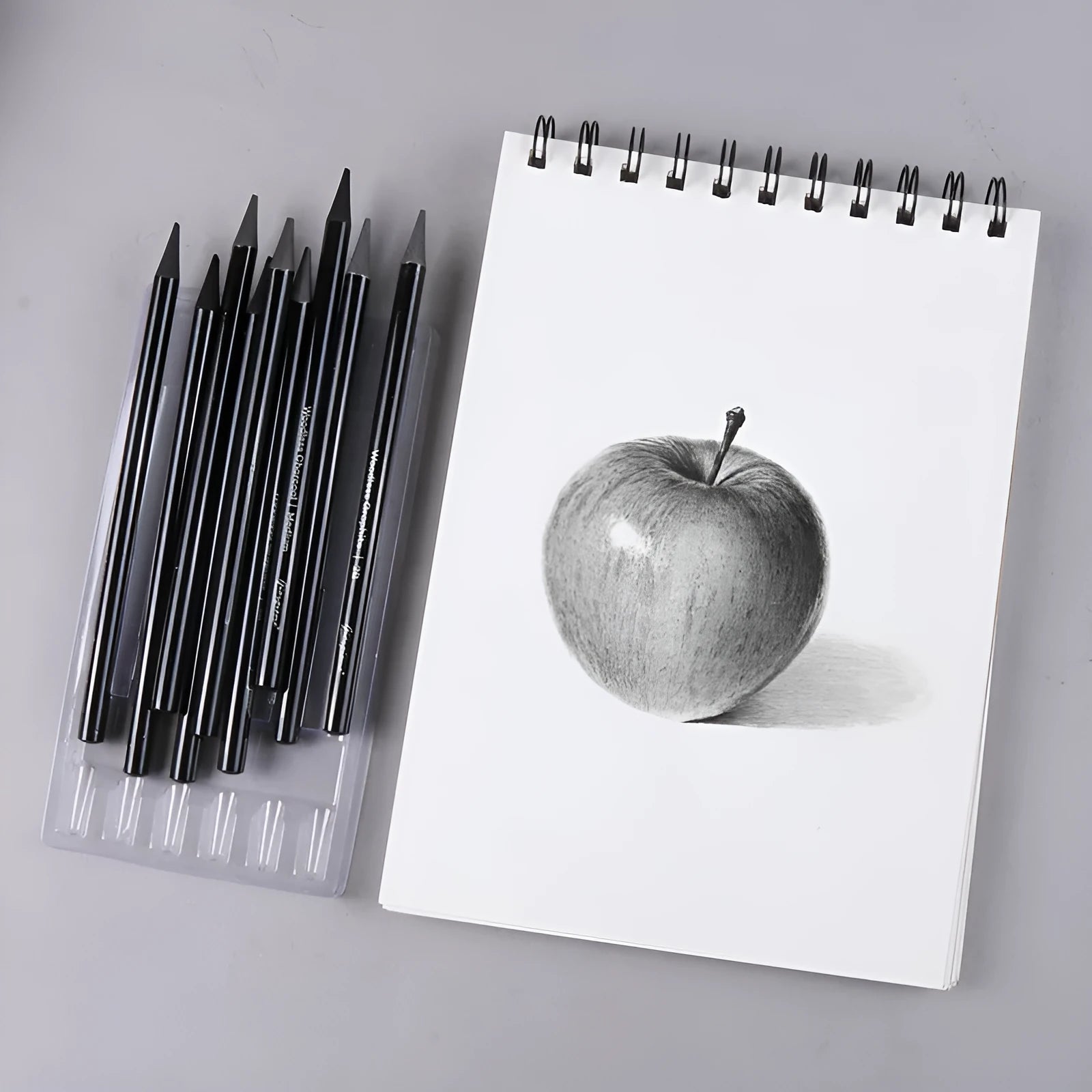 Carbonized pencil suit solid graphite set with six graphite pencils and three carbonized pencils on suction card
