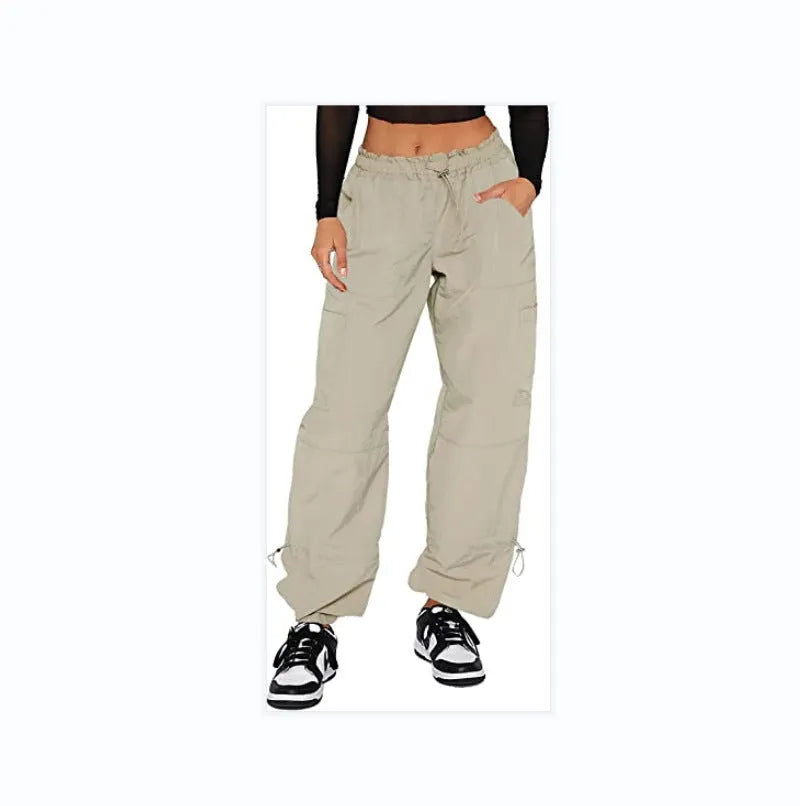 Straight leg multi-pocket cargo trousers in polyester fabric, shown in a neutral colour with visible cargo pockets.