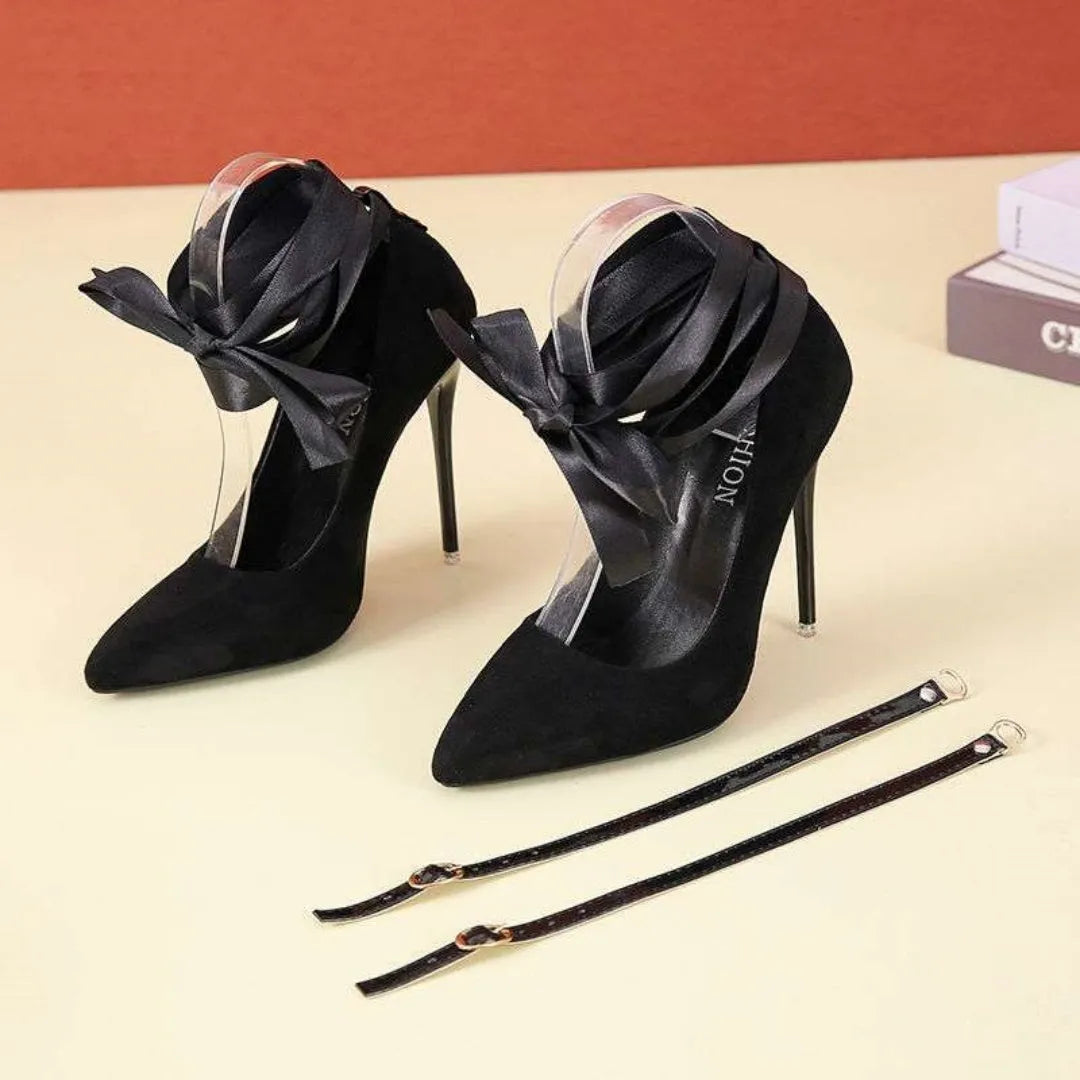 Black pointed toe high heel with lace ankle strap on a 12cm heel.