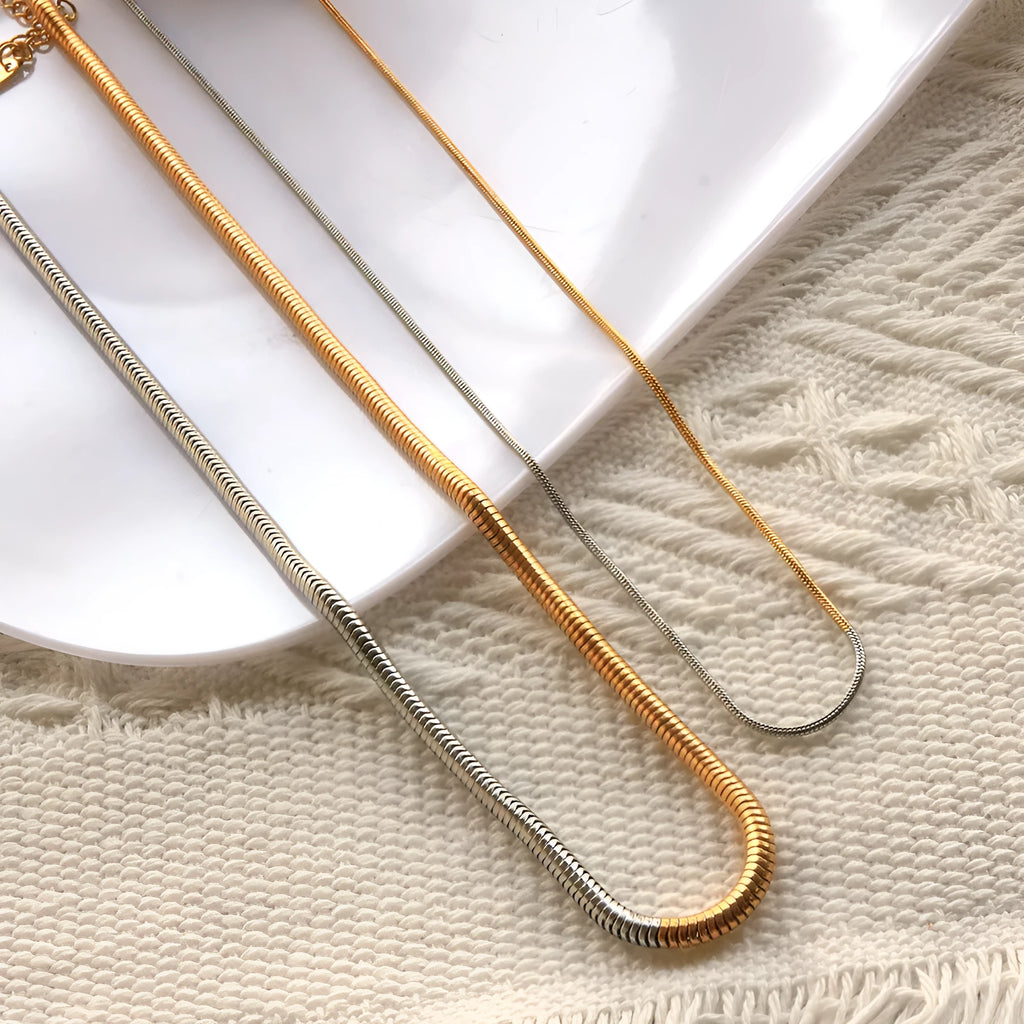Gold-tone stainless steel snake bones chain necklace with 3mm geometric design for women