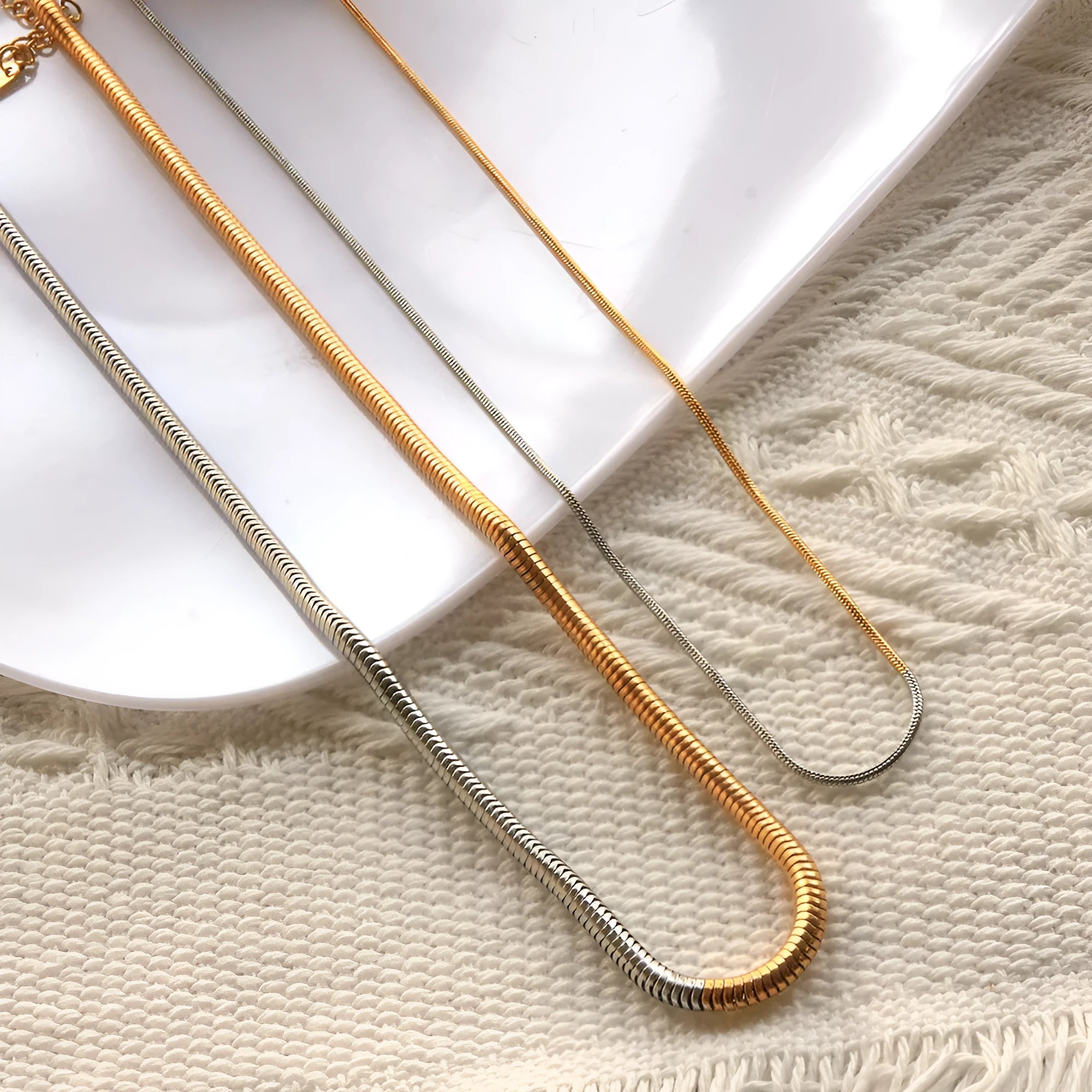 Gold-tone stainless steel snake bones chain necklace with 3mm geometric design for women