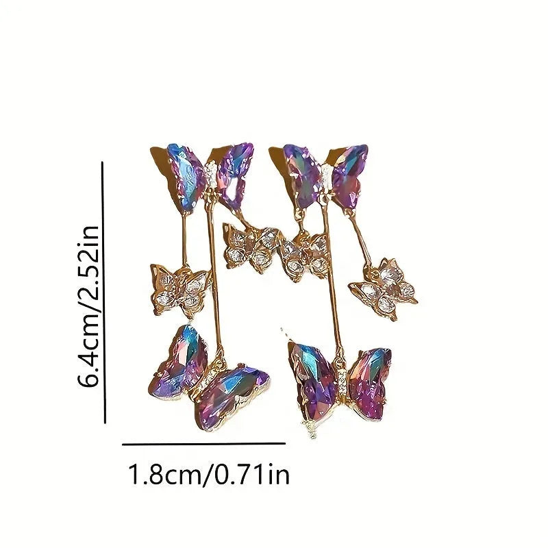 Silver needle crystal flowers butterfly tassel earrings in blue purple colour with electroplated alloy construction