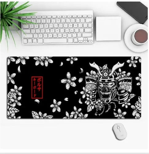 Large custom anime print gaming mouse pad on a desk with keyboard and mouse.