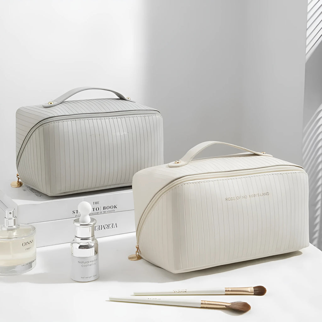Vertical pattern pillow makeup bag in PU leather showing cubic shape and large storage capacity