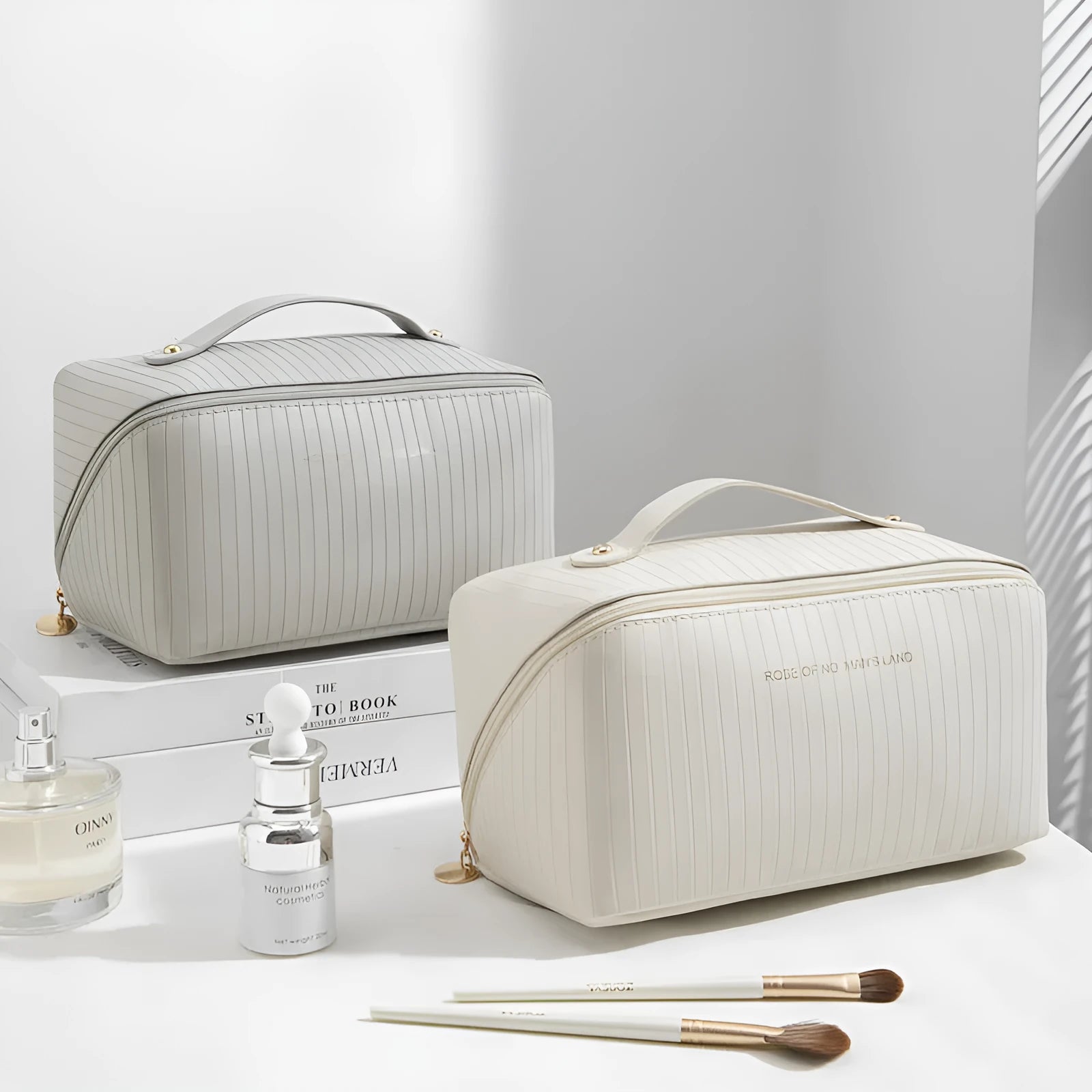 Vertical pattern pillow makeup bag in PU leather showing cubic shape and large storage capacity