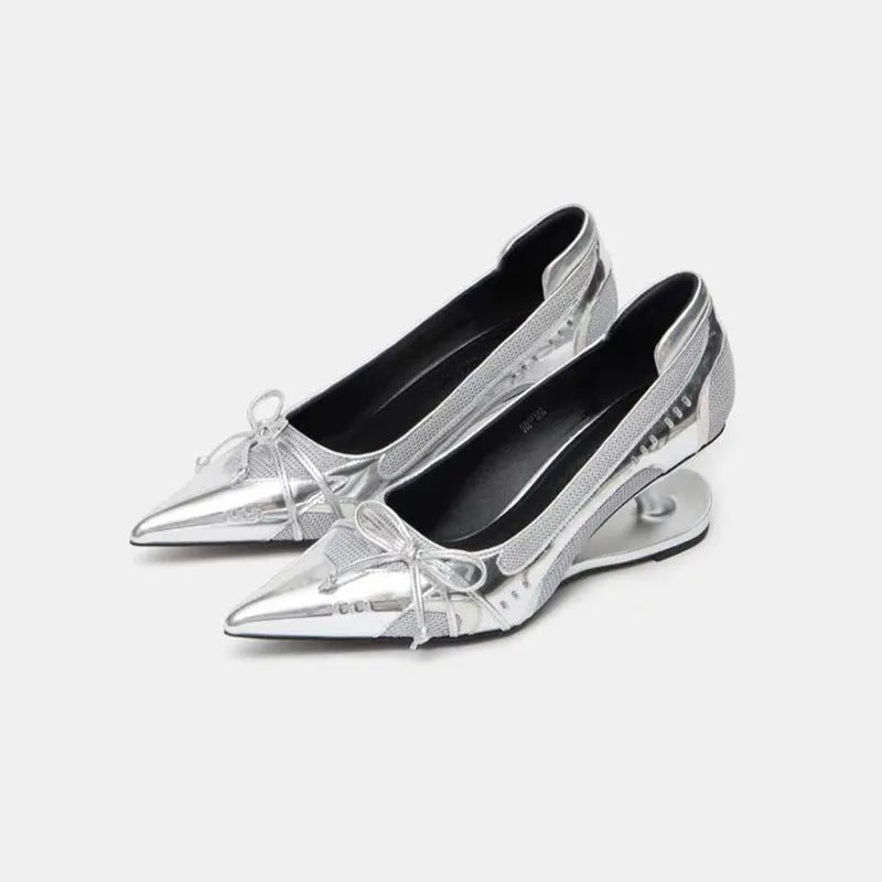 Women's black pointed toe Mary Jane shoes with shaped floating heel and microfiber leather upper on display