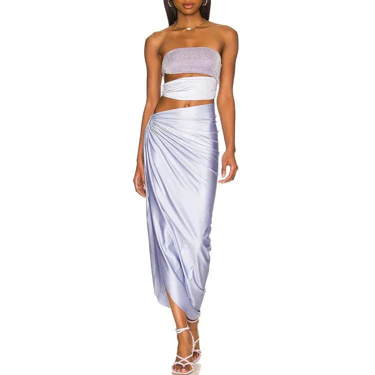 Purple one-piece swimsuit with matching wrap skirt in polyester fabric
