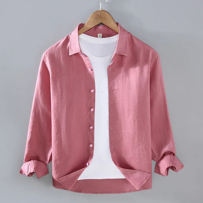 Man wearing a simple solid-colour linen cardigan-style shirt with long sleeves.