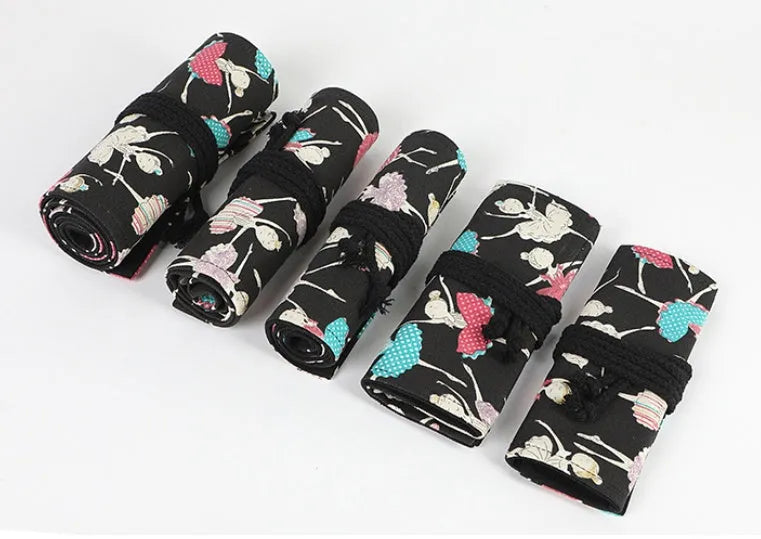 Square canvas pencil case with ballet girl print, showing elastic loops inside for organising pencils.