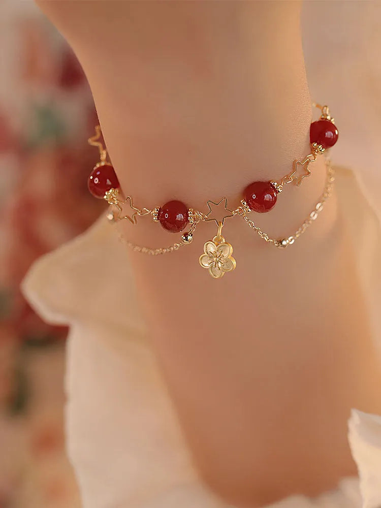 Women's double layer bracelet with natural red agate and peach blossom floral design in red colour