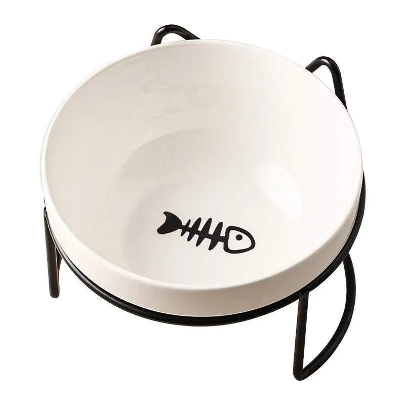 White ceramic cat bowl with decorative pattern and black iron frame support