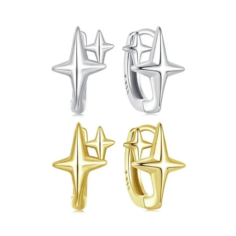 Minimalist sterling silver star-shaped clip-on earrings featuring a XINGX pattern and oxidised finish.