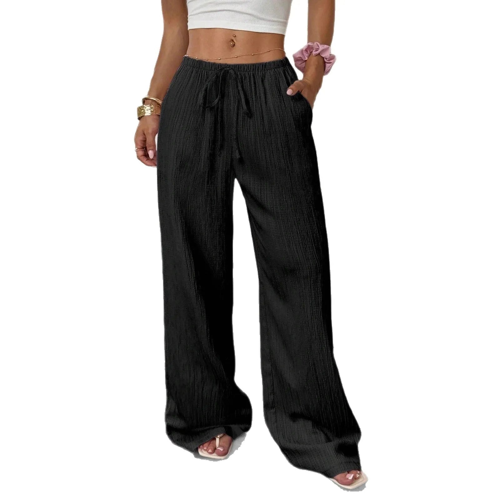 Black wide leg women's trousers with a lace-up waist trimming detail on a mid waist.