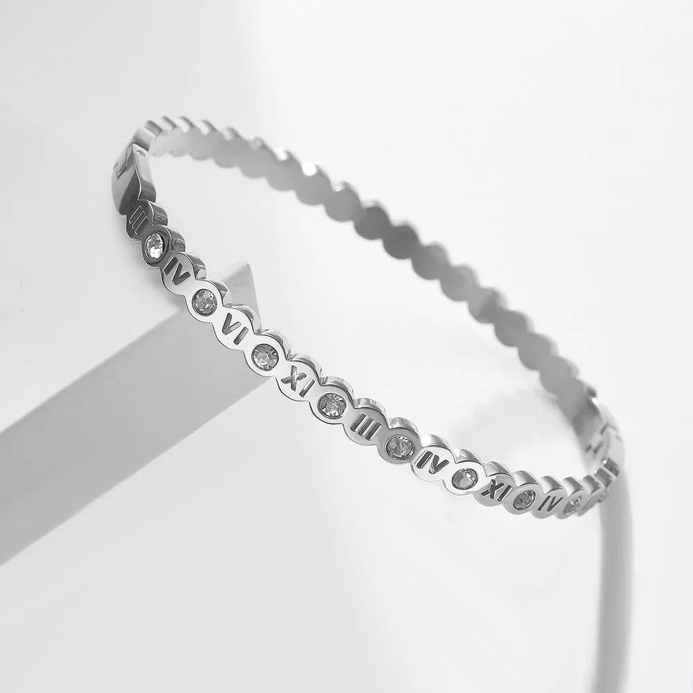 Korean style titanium steel bracelet with number charm in gold, rose gold or steel colour