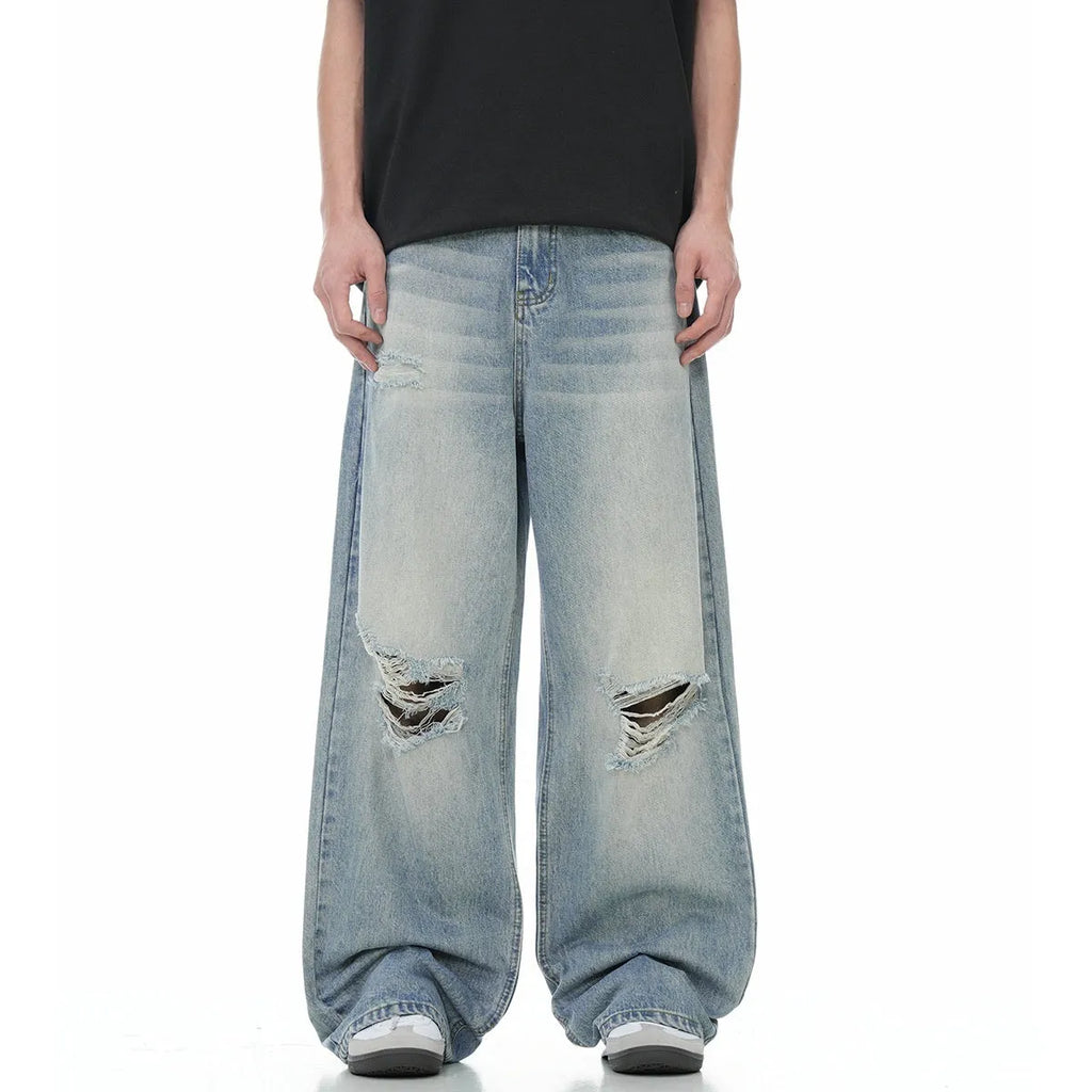 Men's blue straight-leg jeans with retro ripped detailing and an adjustable waistband