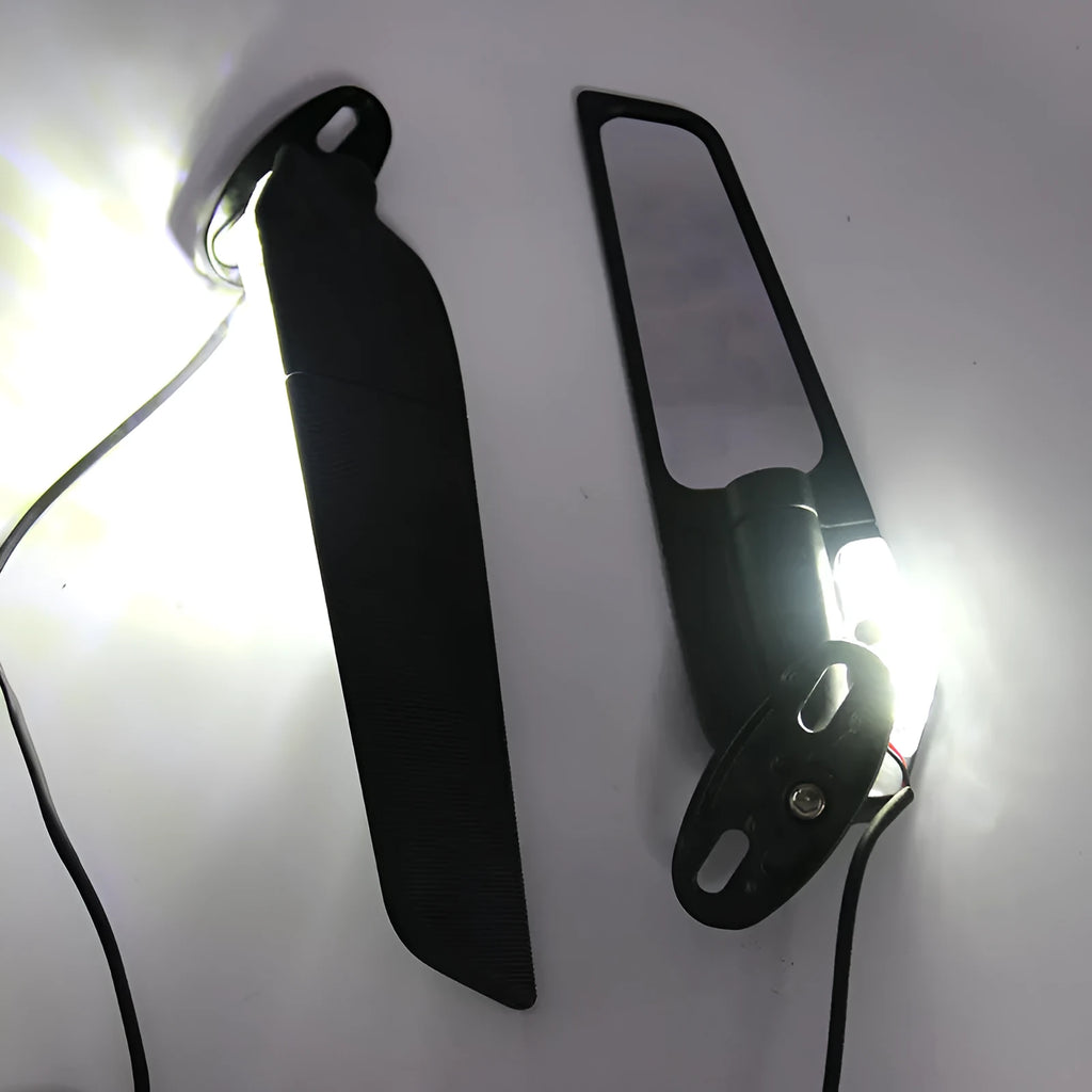 Pair of aluminium motorcycle spoiler rearview mirrors with convex glass lenses and integrated yellow running lights.