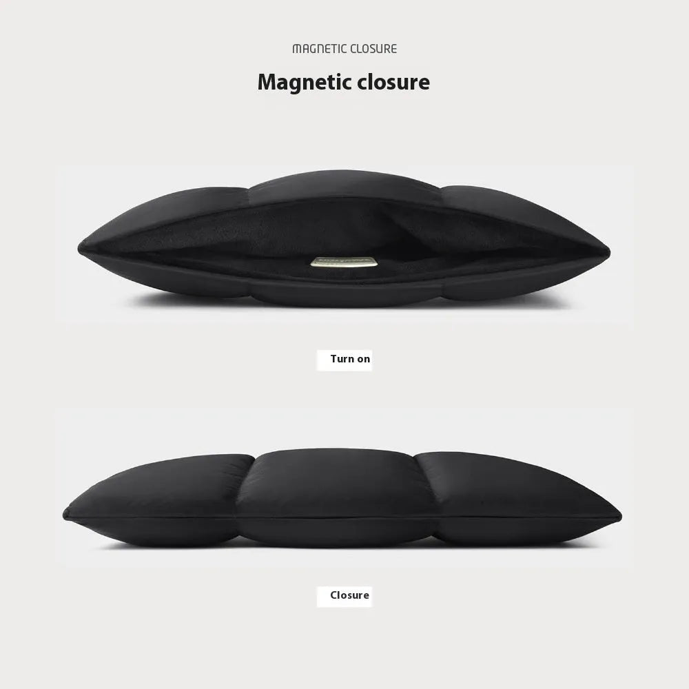 Soft black polyester laptop sleeve for 13-15.6 inch laptops on a table.