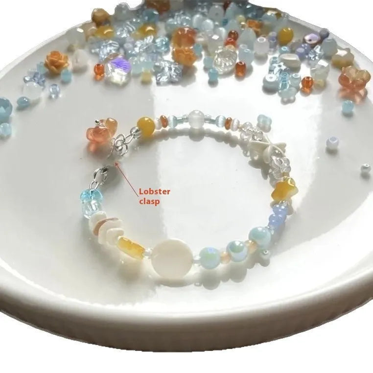 Women's alloy bracelet with diamond shape design in water-soaked orange seaside colour