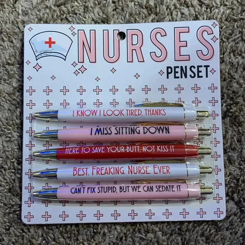 Set of five plastic retractable ballpoint pens with nurse-themed text and slogans.