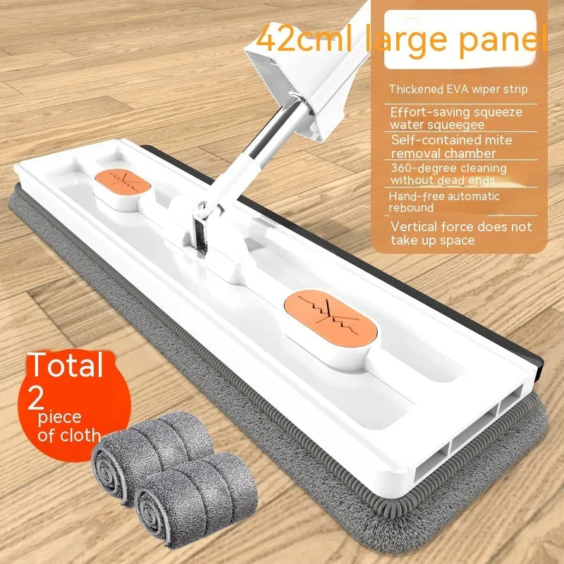 Large flat mop with stainless steel handle and blue cloth on hard floor