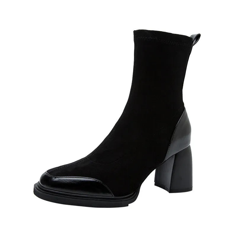 Genuine leather women's short martin boots in black matte finish with high heel and rubber sole