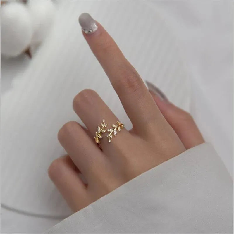 Women's copper branch ring with geometric leaf design in electroplated gold or silver finish