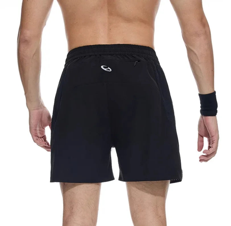 Black and blue four-point stretch running shorts with laser-stitched seams laid flat.