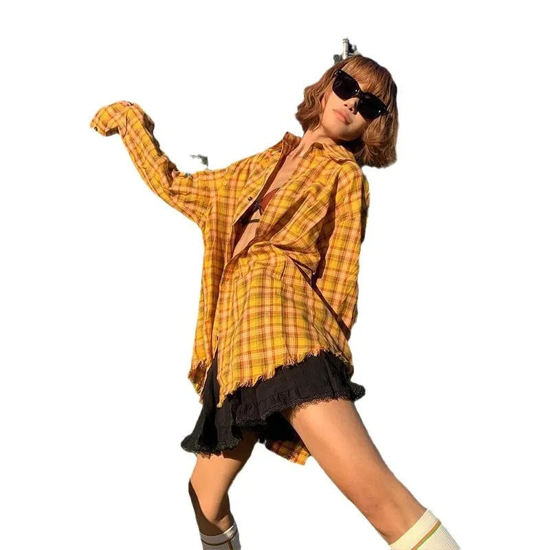 Man and woman modelling a loose-fit dopamine yellow plaid casual shirt.