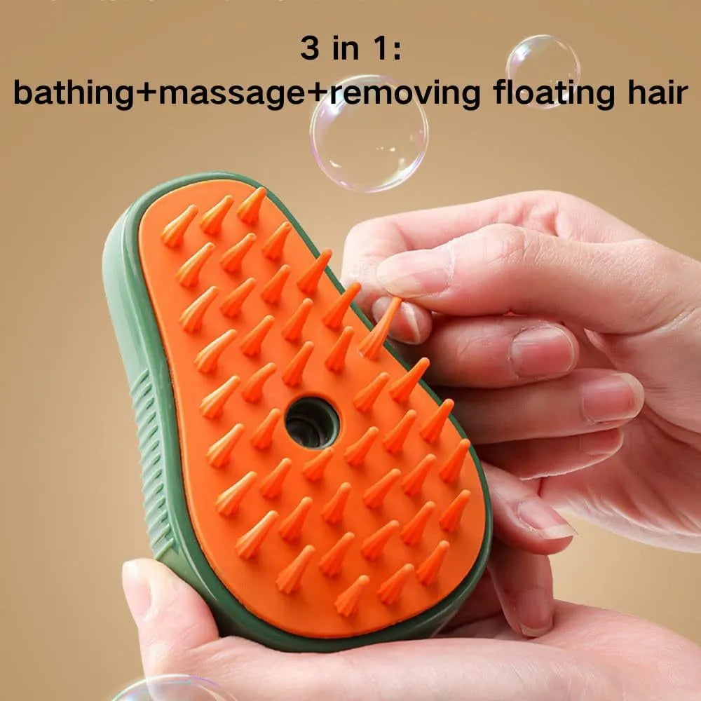 Green and white rechargeable cat steam grooming brush with silicone teeth on a wooden table.