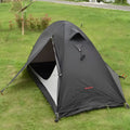 Single person tent with aluminium poles in black colour showing double account structure and mesh ventilation panels