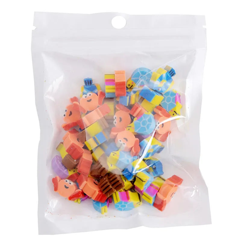 Assortment of fifty small cartoon-shaped rubber erasers in fruit and animal designs.
