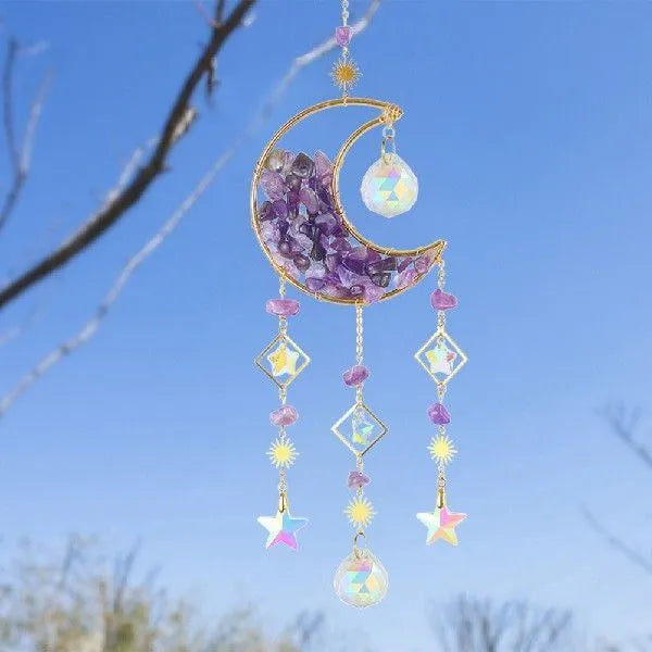 Crystal car pendant with moon design hanging from rear-view mirror