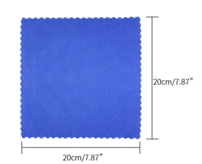 Automotive iron powder remover spray bottle with blue square sponge on car surface