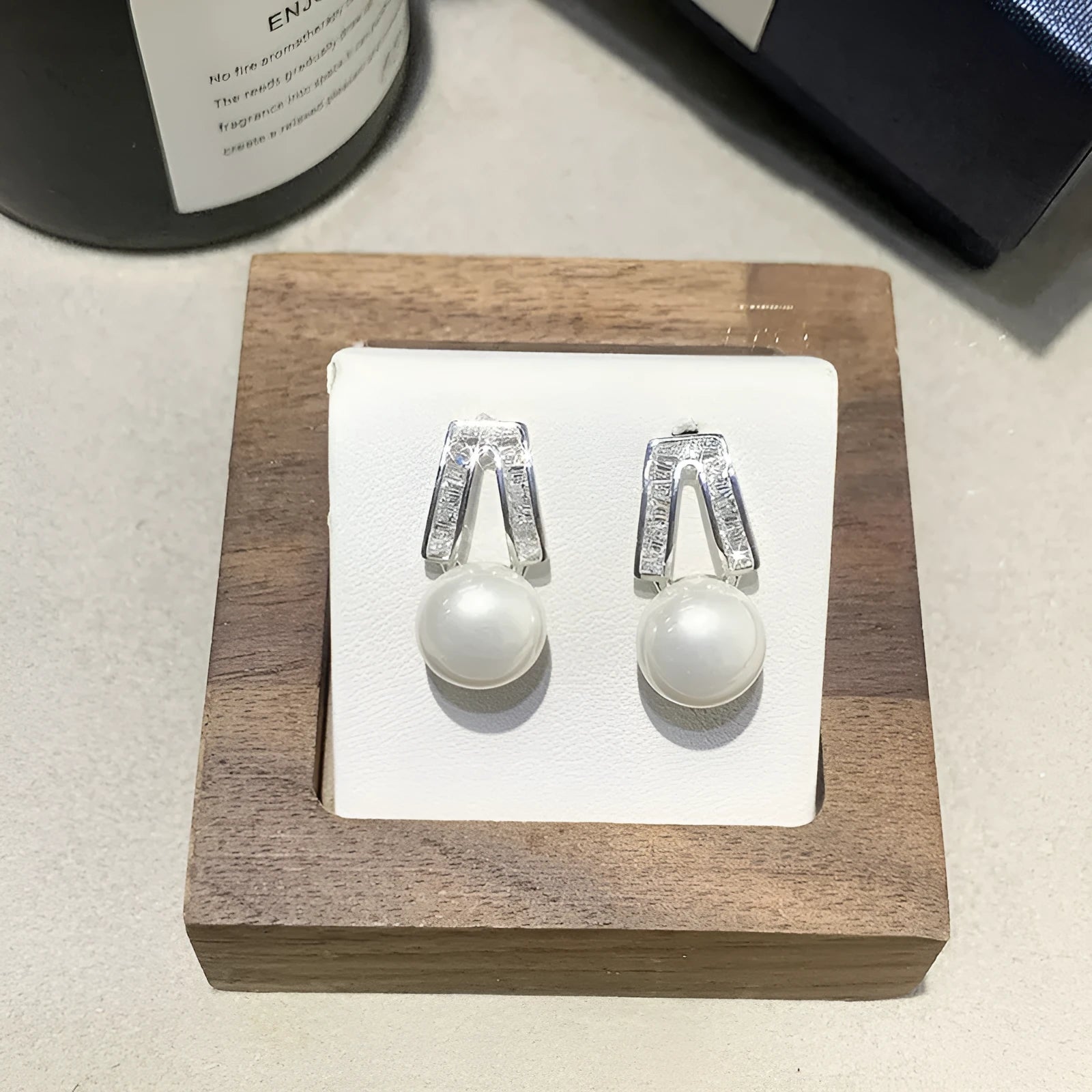 Set of three French retro minimalist faux pearl clip-on earrings in gold and silver tones