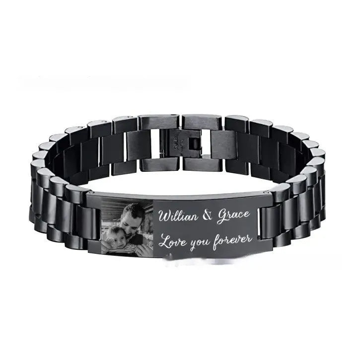 Titanium steel men's bracelet with curved heart shape and black lettering on a grey background.