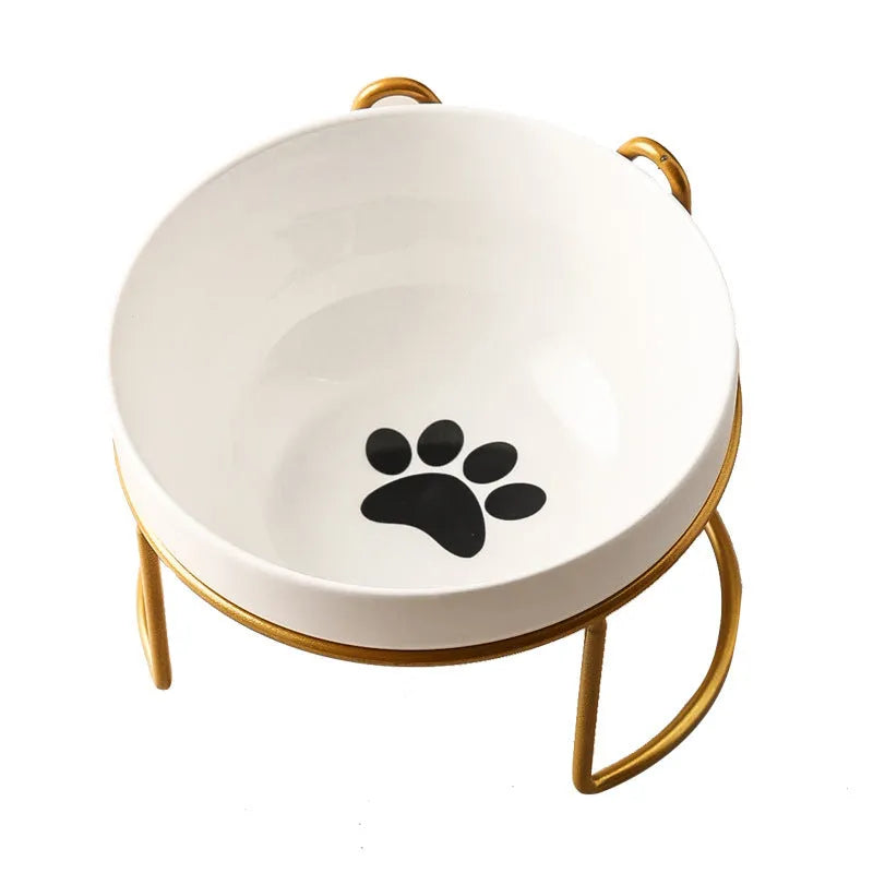 White ceramic cat bowl with decorative pattern and black iron frame support