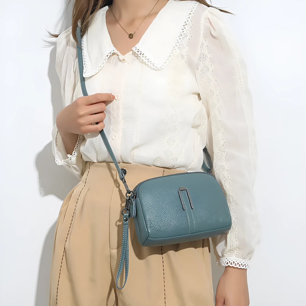 Genuine leather women's shoulder bag in horizontal square shape, shown in one of five colour options.