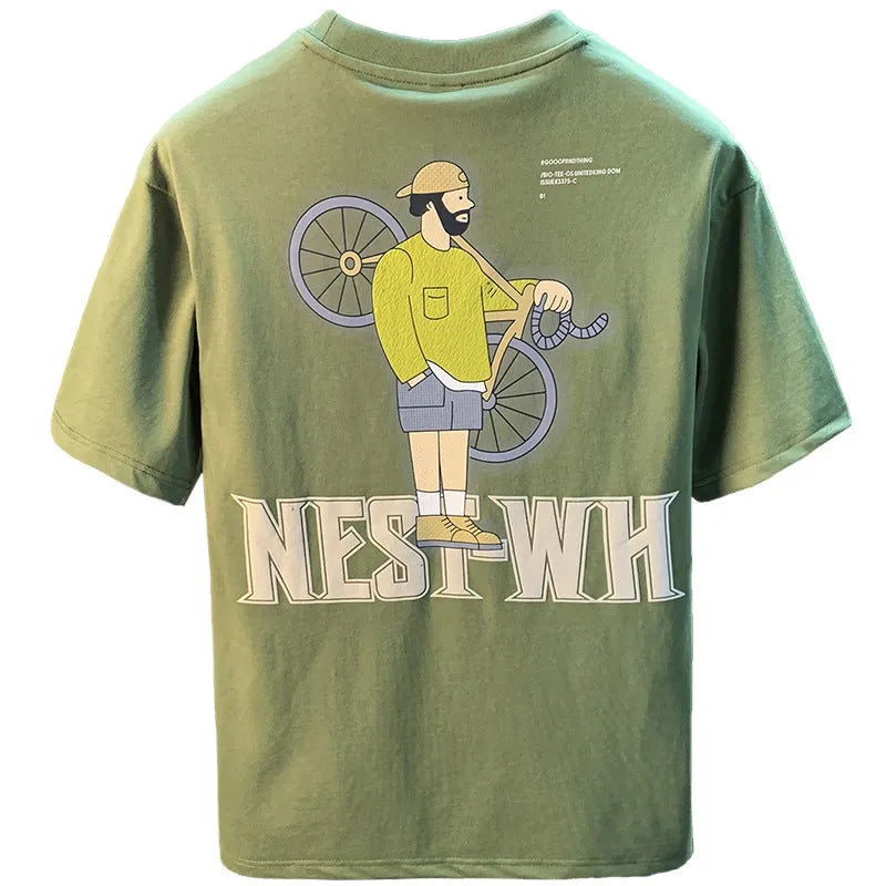 Green loose fit men's t-shirt with a front graphic print and short sleeves on a hanger.