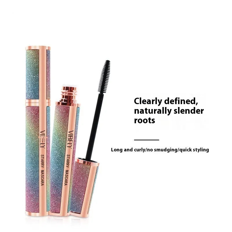 Black waterproof mascara with applicator brush for long thick curling lashes