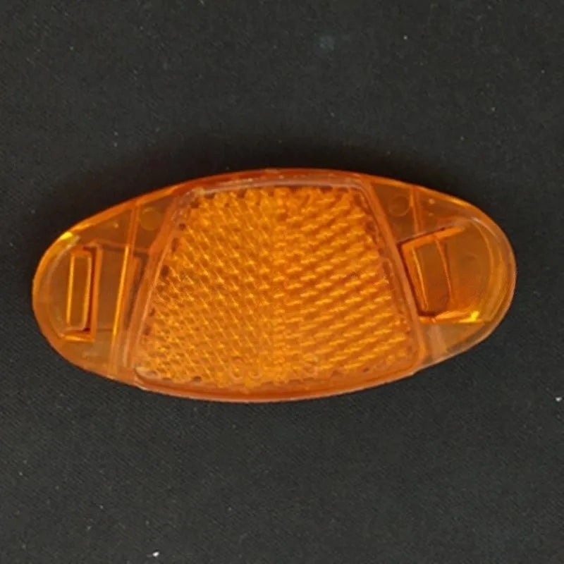 Bicycle spoke reflector in yellow or white measuring 7.2cm by 3.5cm with night warning film